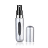 Silver portable mini perfume refill spray bottle with a black cap and a separate silver refill component.