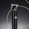 A black cordless hair trimmer kit with three different length comb attachments shown against a dark background.