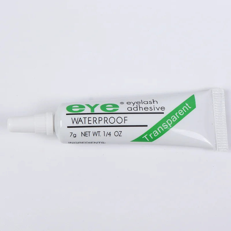 A tube of transparent waterproof eyelash adhesive labeled eye eyelash adhesive with 7g net weight.