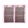 A pair of pink eyelash extension strips with black false lashes are displayed in a packaging box.
