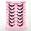 Un plateau en plastique rose contenant un ensemble de faux cils de mink 3D dramatiques.
