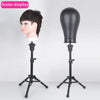 A black adjustable wig stand tripod with a stable base and a mannequin head display.