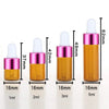 A set of five glass dropper bottles containing essential oils or samples in various sizes from 1ml to 5ml.