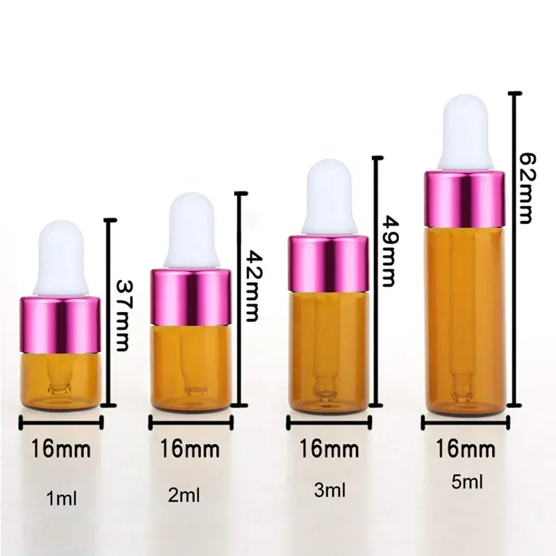 A set of five glass dropper bottles containing essential oils or samples in various sizes from 1ml to 5ml.