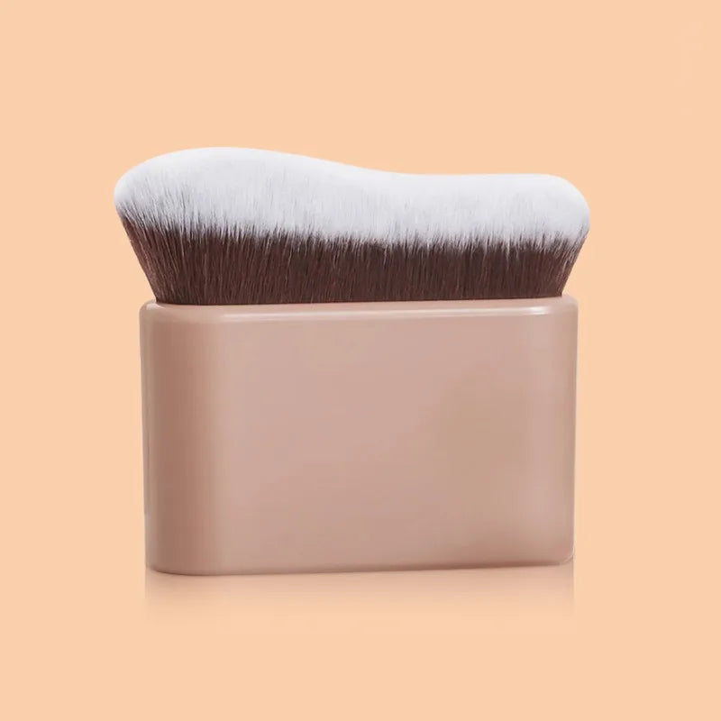 A precision hand-held foundation makeup brush with soft gray and white bristles in a beige holder.
