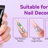 A black tube of Makart Rhinestone Glue is shown next to a hand displaying various nail decorations.