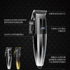 A sleek black electric hair trimmer with a silver finish, showing various trimming attachments and LED indicators.