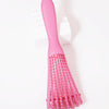 A pink adjustable detangling hair brush with fine bristles is shown against a white background.