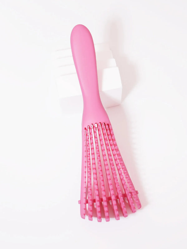A pink adjustable detangling hair brush with fine bristles is shown against a white background.