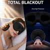 Mujer usando una máscara de dormir 3D negra y contorneada para oscuridad total y cero presión ocular.