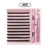A pink DIY eyelash extension kit with a brush and tweezers is shown in a rectangular case.