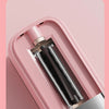 A pink double-edged blade hair trimmer is shown in a close-up view.