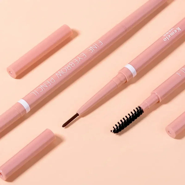 A pink Kemo eyeliner pencil with a brush tip is shown diagonally on a light background.
