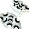 A set of natural mink striped false eyelash extensions displayed in an open white packaging.