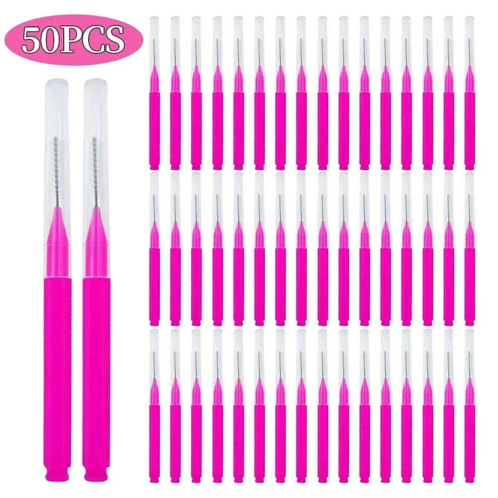 A set of 50 mini brow and eyelash combs in bright pink.