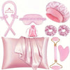 A pink heatless curling kit featuring a silk pillow, hair accessories, and a curling iron tool.