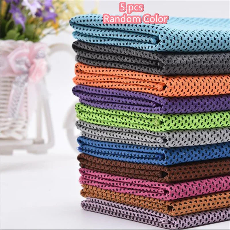 A stack of five random colored ultra soft quick-dry sport towels for gym and travel.