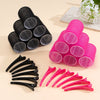 A set of black and pink self-grip hair rollers for creating heatless curls and volume.