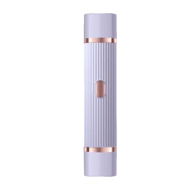 A portable dual-head electric shaver with a light purple body and rose gold accents.