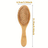 A wooden bamboo comb with numerous teeth used for scalp and hair growth.