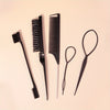 A collection of black hair styling tools including a comb, a brush, and pair of scissors.