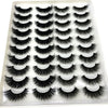 Un plateau de faux cils mink noirs en 3D pour application en bande à haut volume.