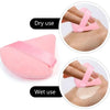 Pink triangular velvet powder puff shown for dry and wet use with a pink silicone applicator.
