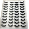 Un plateau de faux cils mink en 3D de divers styles et longueurs.