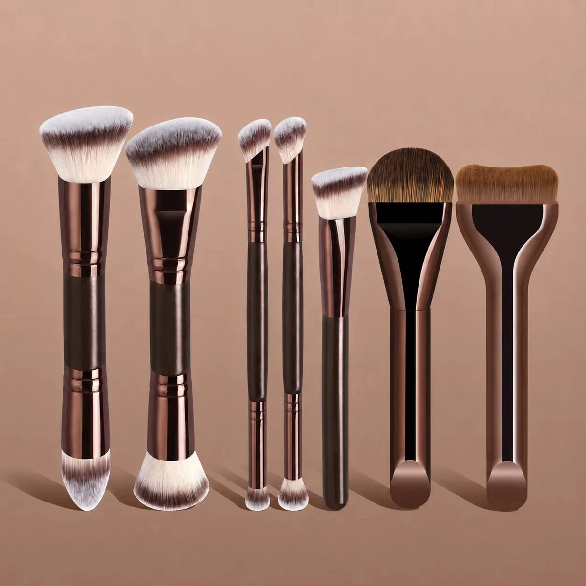 A set of seven professional makeup brushes with varying sizes and shades displayed on a neutral background.