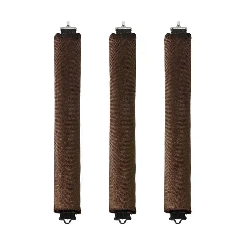 Three black heatless hair curler curling rods standing vertically.