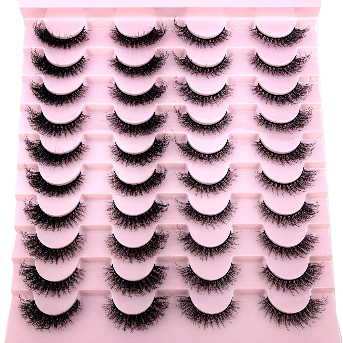 Plateau en plastique rose contenant un kit de faux cils mink naturels.