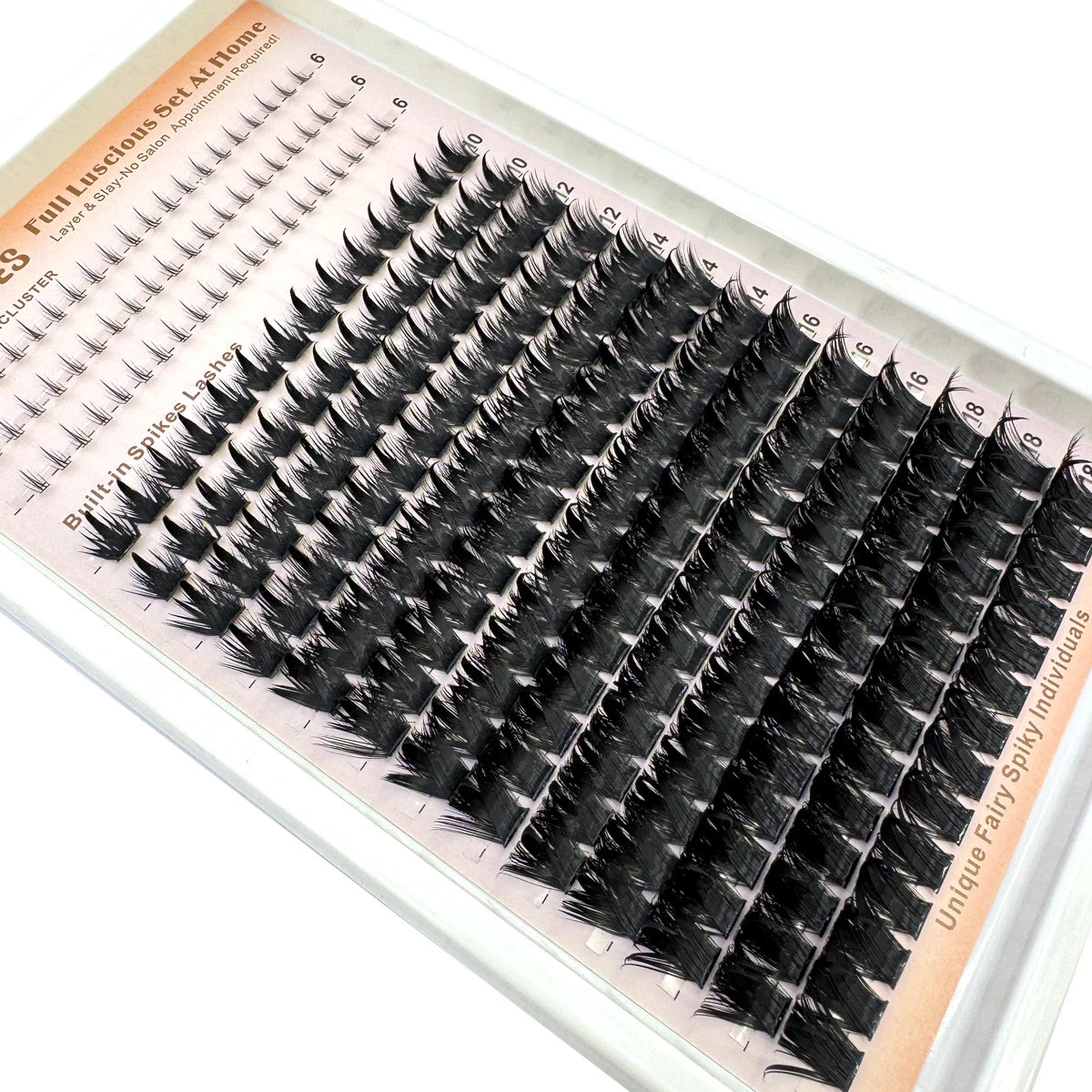 Présentation de clusters de cils pointus DIY pour extensions de salon, montrant divers styles et longueurs.