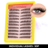 A yellow plastic tray displaying individual segmented false eyelashes for DIY lash clusters.