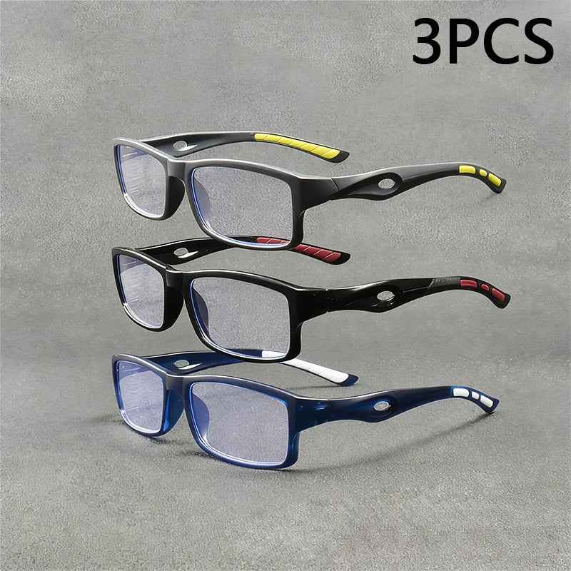 Tres pares de gafas deportivas anti-luz azul para leer, mostrados sobre un fondo gris.