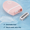 A pink electric mini shaver and a detachable shaving head are shown floating in water.