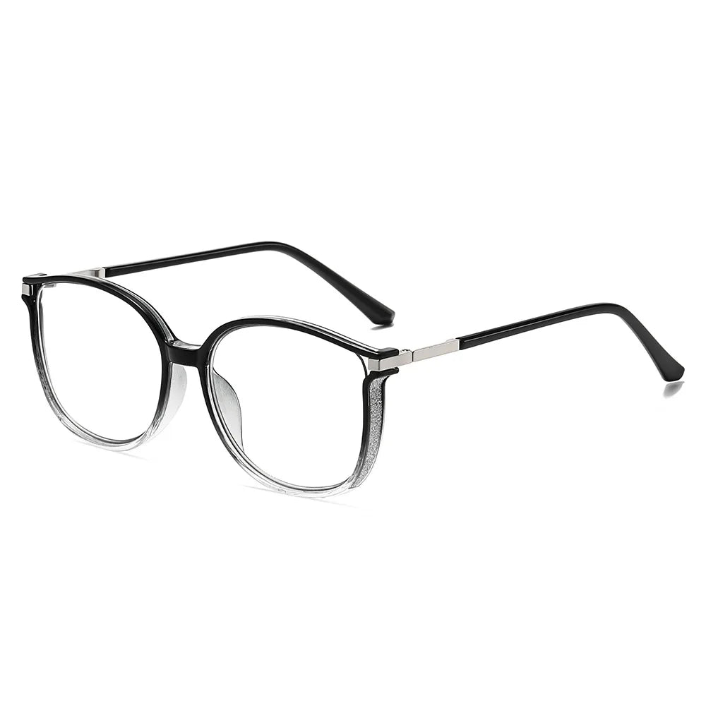 Lunettes de lecture noires et luxueuses, à monture fine en métal et verres clairs.