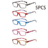 Una colección de cinco pares de gafas de lectura anti-luz azul con diversos colores y patrones.