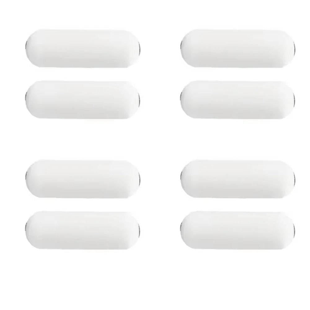 Un set de cuatro aplicadores de loción blancos, diseñados con doble cabezal.