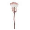 A rose gold nail art dust brush set with a fluffy brush and handle.