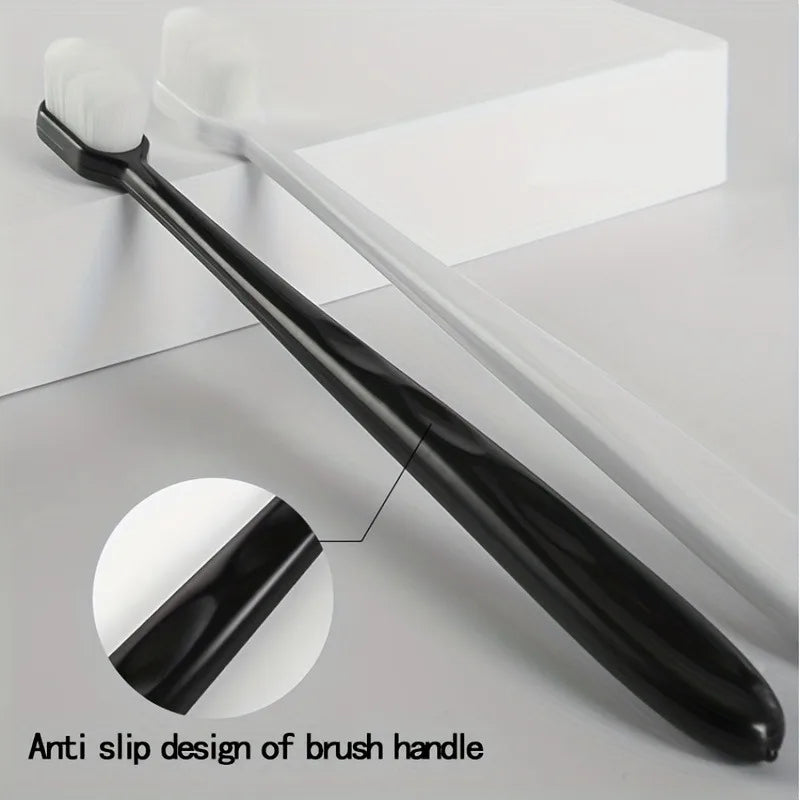 Close-up view of a black toothbrush handle featuring an anti-slip design.