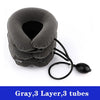 Gray three-layer inflatable cervical neck traction pillow with three tubes and a black hose