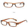 A pair of tortoise-shell framed reading glasses with clear lenses shown in a positive and 45 degree side view.