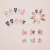 Colección de uñas postizas de mariquita verde fresca en 3D, en varias formas y colores.