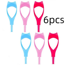 A set of six pink and blue mascara shield applicators for eye makeup.