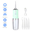 A portable USB rechargeable dental water flosser with a green body, 4 nozzles, and various tips.