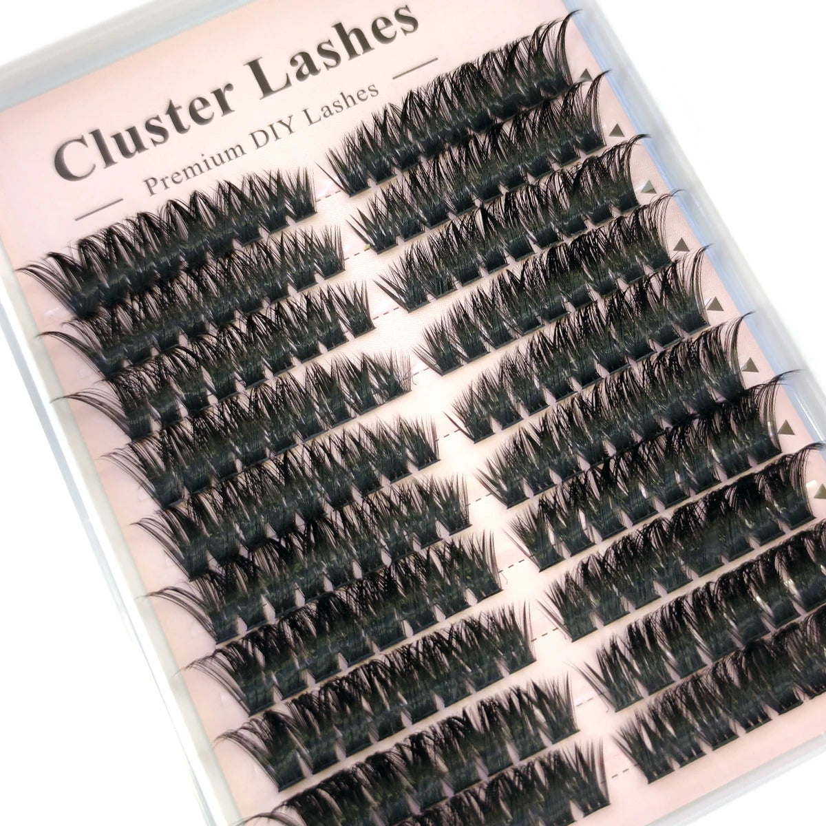 A display of black cluster lashes in various styles and lengths for DIY lash extensions.