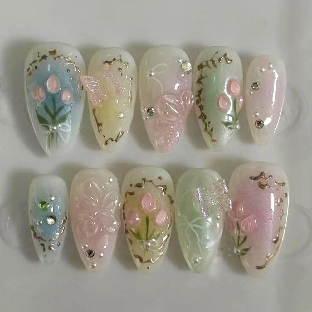 A set of 24 pink heart pearl press-on fake nails featuring iridescent and floral designs.