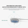 A close-up view of a 6mm large swing silicone toothbrush head on a white handle.