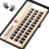 A close-up of IGUIONSS lash clusters showing natural wispy eyelash extensions being applied.