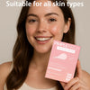 A woman holds a pink pimple patch product for acne blemishes